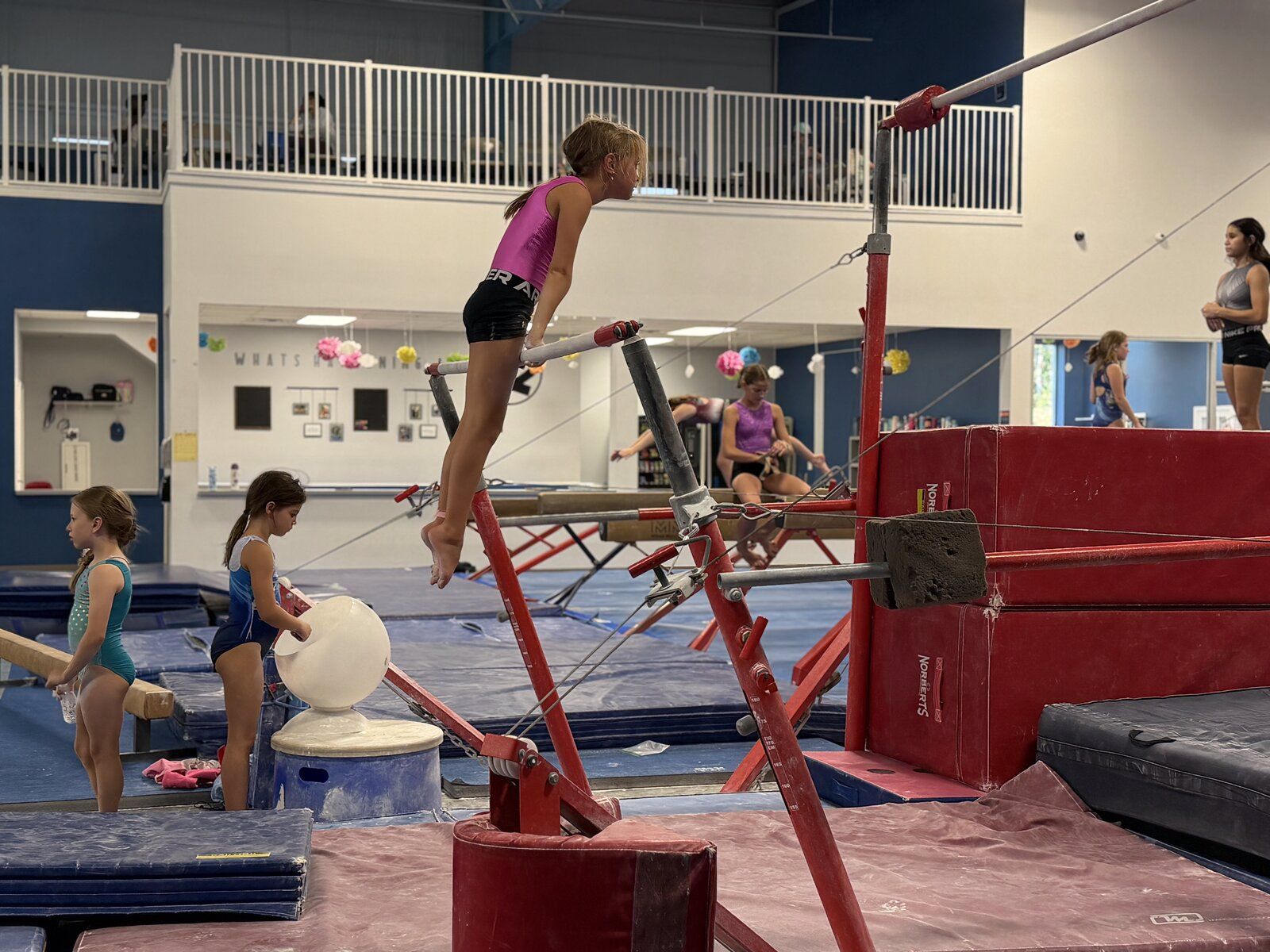 Gymnasts training on the bars at K2 Academy